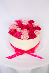 Pink marzipan roses on a cake