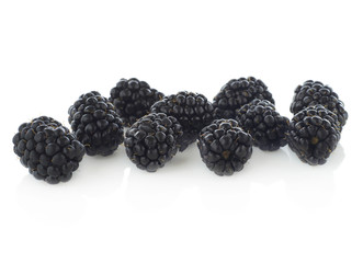 Blackberry fruits on white