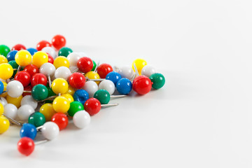 colorful color push pins isolated on white background