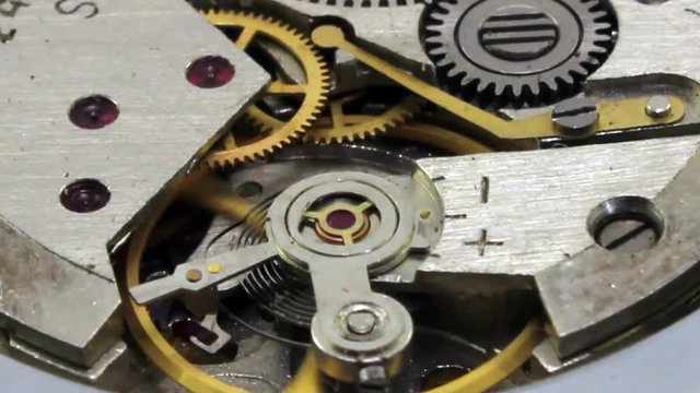 Old watch mechanism at work.
