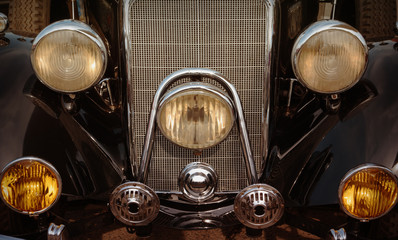 Bumper and headlights of an old car