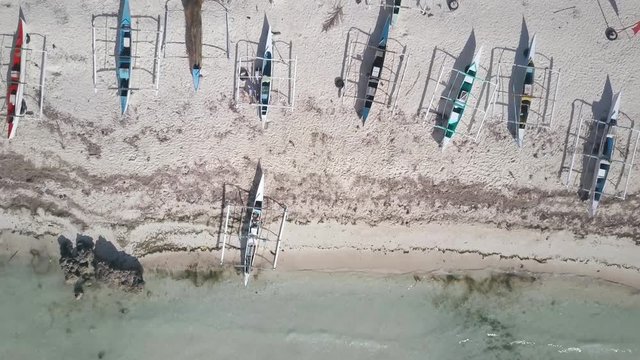 Bohol - April 2017: Aerial view of tropical beach with pump boats. Philippines.