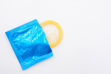 Condom in a Opened Package isolated on a white background