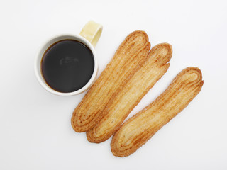 Japanese crispy ell pie and a cup of coffee in top view
