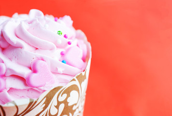 Close up of cup cake dessert on red backgrounds
