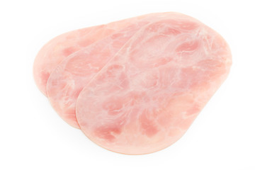Thin slices of ham on white background.