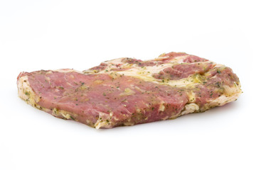 Fototapeta premium Pork chop, marinated. Isolated on the white background.