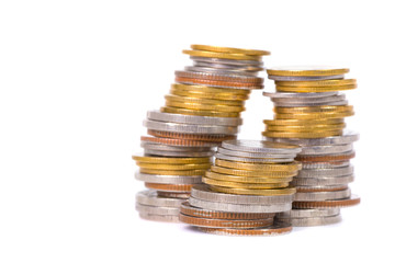 Columns of coins, piles of coins on white background