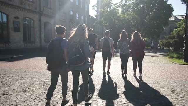 Group of college students walking outdoors