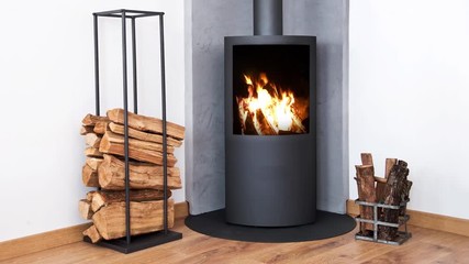 Seamless loop - fire in modern wood stove near wood racks, HD video