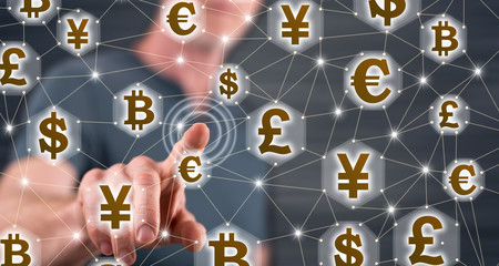 Man touching a currency network concept on a touch screen