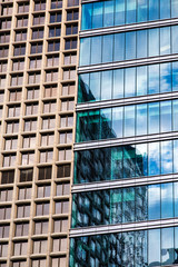 Blue Glass and Old Stone Towers