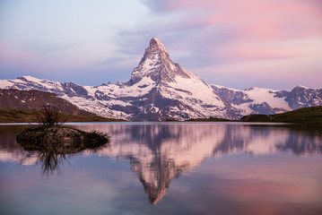 Colorful summer panorama of the Matterhorn pyramid and Stellisee lake. Few minutes before sunrise. Great june outdoor scene in Swiss Alps, Zermatt, Switzerland, Europe 2017