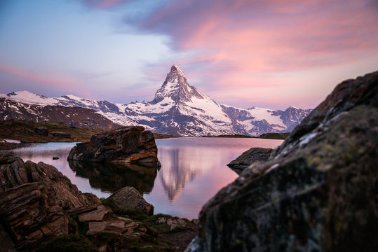 Colorful summer panorama of the Matterhorn pyramid and Stellisee lake. Few minutes before sunrise. Great june outdoor scene in Swiss Alps, Zermatt, Switzerland, Europe 2017