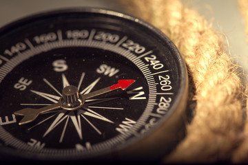 Vintage compass in blue background