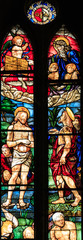 Stained glass window of Christ's Baptism  in Cathedral of Arezzo made by Guillaume de Marcillat, 1519