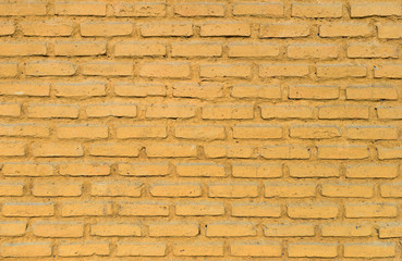 colorful yellow brick wall background.