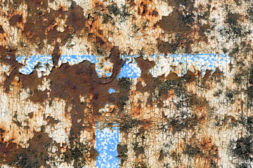 Rusty surface. A closeup shot of a metal surface with dirt, moss and rust.