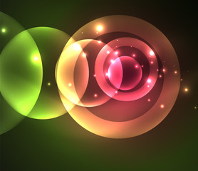 Glowing shiny overlapping circles composition on dark background