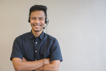 close up call center man smiling for happy working concept