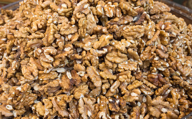 Heap of unshelled walnuts