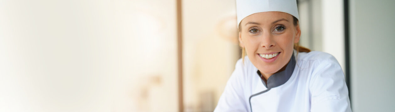 Portrait Of Pastry Chef Standing By Raspberry Cake, Template