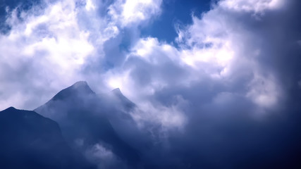 Naklejka premium beautiful panorama Mountains above the clouds. Above the clouds 