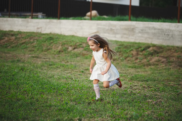 little beautiful running girl outside