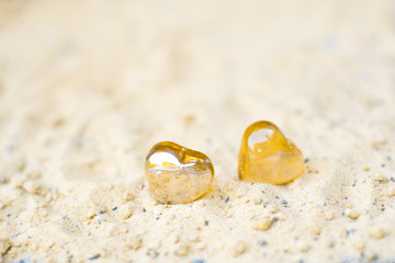 Hearts on sand on the beach concept of feeling.