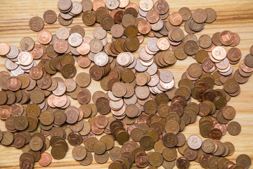 Old Latvian coins on a wooden background