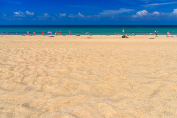 Fototapeta na wymiar Close up sand with sea sky background