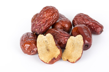 Chinese red dates on the white background.