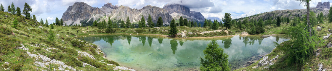 Naklejka na ściany i meble Panoramic view of lake and mountains, Italian Alps