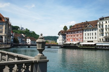 Fototapeta na wymiar View of the old town of Lucerne on the river Reuss