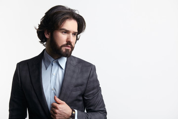 Man in elegant suit on white