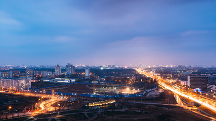 Fototapeta na wymiar Minsk, Belarus. Aerial View Cityscape In Bright Blue Hour Evening