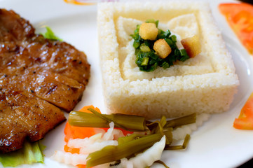 Grilled chop with rice and steam vegetables