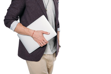 Cropped shot of young man in casual clothes holding laptop isolated on white