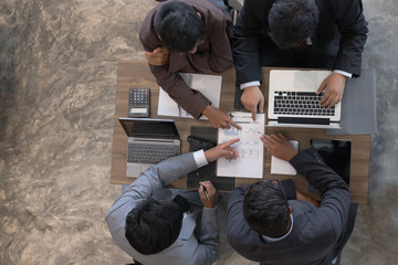young business people and entrepreneur having a meeting around table in office. Conference, discussion, teamwork, collaboration, corporate concept.