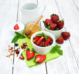 Homemade granola with strawberries