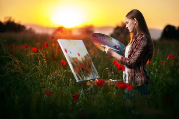 Fotobehang Schilderij Fine art artist. En plein air. Painting in the landscape. Female artist working on painting. Plein air painting  © Serhii