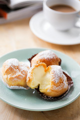 cream puff with vanilla stuff for coffee break