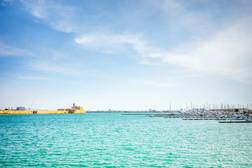 Fototapeta premium Port and medieval fortress in Brindisi, Italy