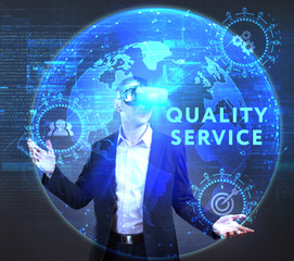 The concept of business, technology, the Internet and the network. A young entrepreneur working on a virtual screen of the future and sees the inscription: Quality service
