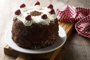 Chocolate and whipped cream cake with cherries or Black Forest cake