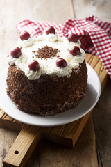 Chocolate and whipped cream cake with cherries or Black Forest cake