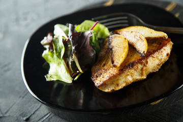 Fried turkey with pear and mixed salad