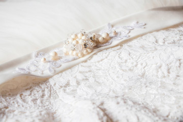Obraz na płótnie Canvas Close up of the wedding dress detail