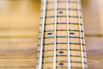 closeup of electric bass guitar fingerboard