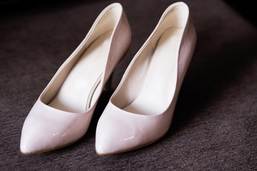 bride's shoes on the sofa
